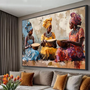 Quadro Africano Beleza e Tradição Feminina deitado sobre a superfície, mostrando os detalhes da moldura inferior direita.