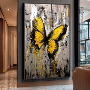 Quadro Borboleta Amarela em Explosão de Cores deitado sobre a superfície, mostrando os detalhes da moldura inferior direita.