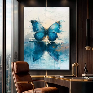 Quadro Borboleta Azul em Tons de Ouro deitado sobre a superfície, mostrando os detalhes da moldura inferior direita.