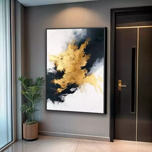 Quadro Dourado Crepúsculo Entre Luzes e Sombras deitado sobre a superfície, mostrando os detalhes da moldura inferior direita.