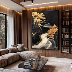 Quadro Dourado Riacho Serpenteando Por Entre Montanhas deitado sobre a superfície, mostrando os detalhes da moldura inferior direita.