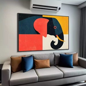 Quadro Elefante Abstrato em Blocos de Cor deitado sobre a superfície, mostrando os detalhes da moldura inferior direita.