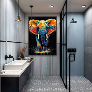 Quadro Elefante Galáctico Resplandecente em Cores Explosivas deitado sobre a superfície, mostrando os detalhes da moldura inferior direita.