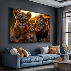 Quadro Família de Leões ao Pôr do Sol Dourado deitado sobre a superfície, mostrando os detalhes da moldura inferior direita.