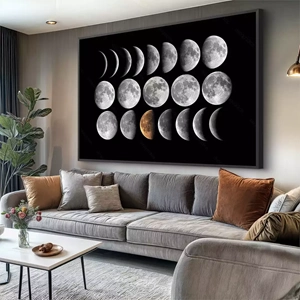 Quadro Fases da Lua deitado sobre a superfície, mostrando os detalhes da moldura inferior direita.