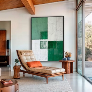 Quadro Geometria Verde deitado sobre a superfície, mostrando os detalhes da moldura inferior direita.