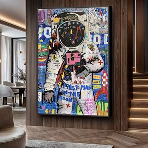 Quadro Grafite Sonhos de Um Astronauta Colorido deitado sobre a superfície, mostrando os detalhes da moldura inferior direita.