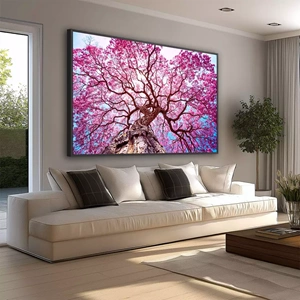 Quadro Ipê Rosa deitado sobre a superfície, mostrando os detalhes da moldura inferior direita.