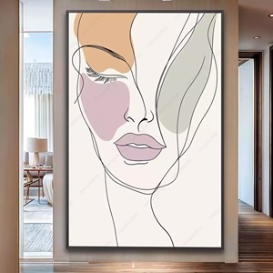Quadro Mulher Abstrata em Contornos Suaves e Cores Poéticas deitado sobre a superfície, mostrando os detalhes da moldura inferior direita.
