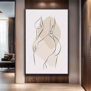 Quadro Mulher Abstrata em Contornos Suaves e Elegantes deitado sobre a superfície, mostrando os detalhes da moldura inferior direita.