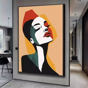 Quadro Mulher Abstrata em Harmonia de Tons Modernos deitado sobre a superfície, mostrando os detalhes da moldura inferior direita.
