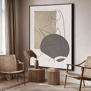 Quadro Mulher Abstrata em Linhas e Formas Orgânicas deitado sobre a superfície, mostrando os detalhes da moldura inferior direita.