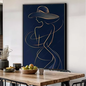 Quadro Mulher Dourada Dançando com o Vento deitado sobre a superfície, mostrando os detalhes da moldura inferior direita.
