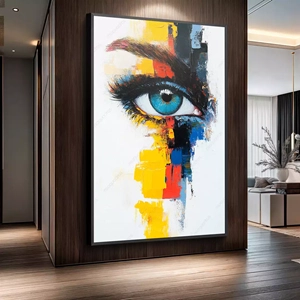 Quadro Olho deitado sobre a superfície, mostrando os detalhes da moldura inferior direita.