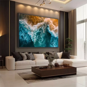 Quadro Ondas do Mar Em Cores Vibrantes deitado sobre a superfície, mostrando os detalhes da moldura inferior direita.
