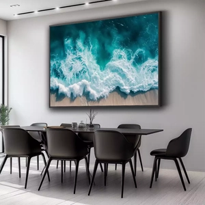 Quadro Ondas do Mar Revelando Mistérios Submersos deitado sobre a superfície, mostrando os detalhes da moldura inferior direita.