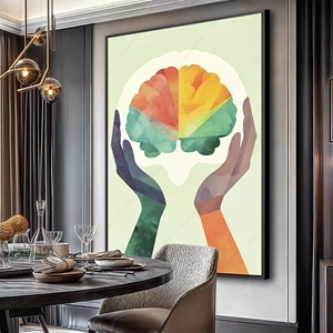 Quadro Psicologia Cromática Mente nas Paletas do Pensamento deitado sobre a superfície, mostrando os detalhes da moldura inferior direita.