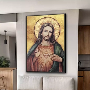 Quadro Sagrado Coração de Jesus deitado sobre a superfície, mostrando os detalhes da moldura inferior direita.