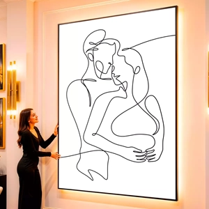 Quadro Casal Enlaçado no Desenho de Uma Linha visto de frente, exibindo sua moldura e sua arte.
