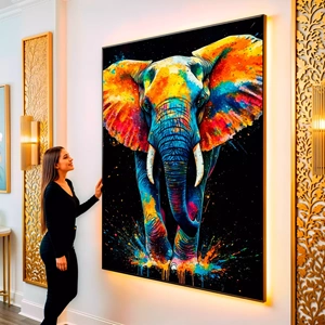 Quadro Elefante Galáctico Resplandecente em Cores Explosivas visto de frente, exibindo sua moldura e sua arte.