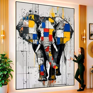 Quadro Elefante Geométrico em Vibração Cromática Moderna visto de frente, exibindo sua moldura e sua arte.