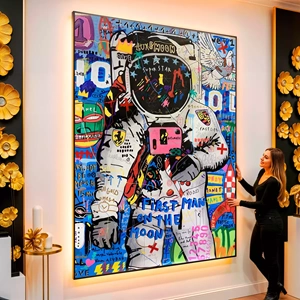 Quadro Grafite Sonhos de Um Astronauta Colorido visto de frente, exibindo sua moldura e sua arte.