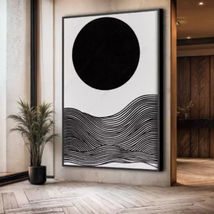 Ambiente decorado com um quadro pendurado na parede que retrata Abstrato Preto e branco sob a lua serena